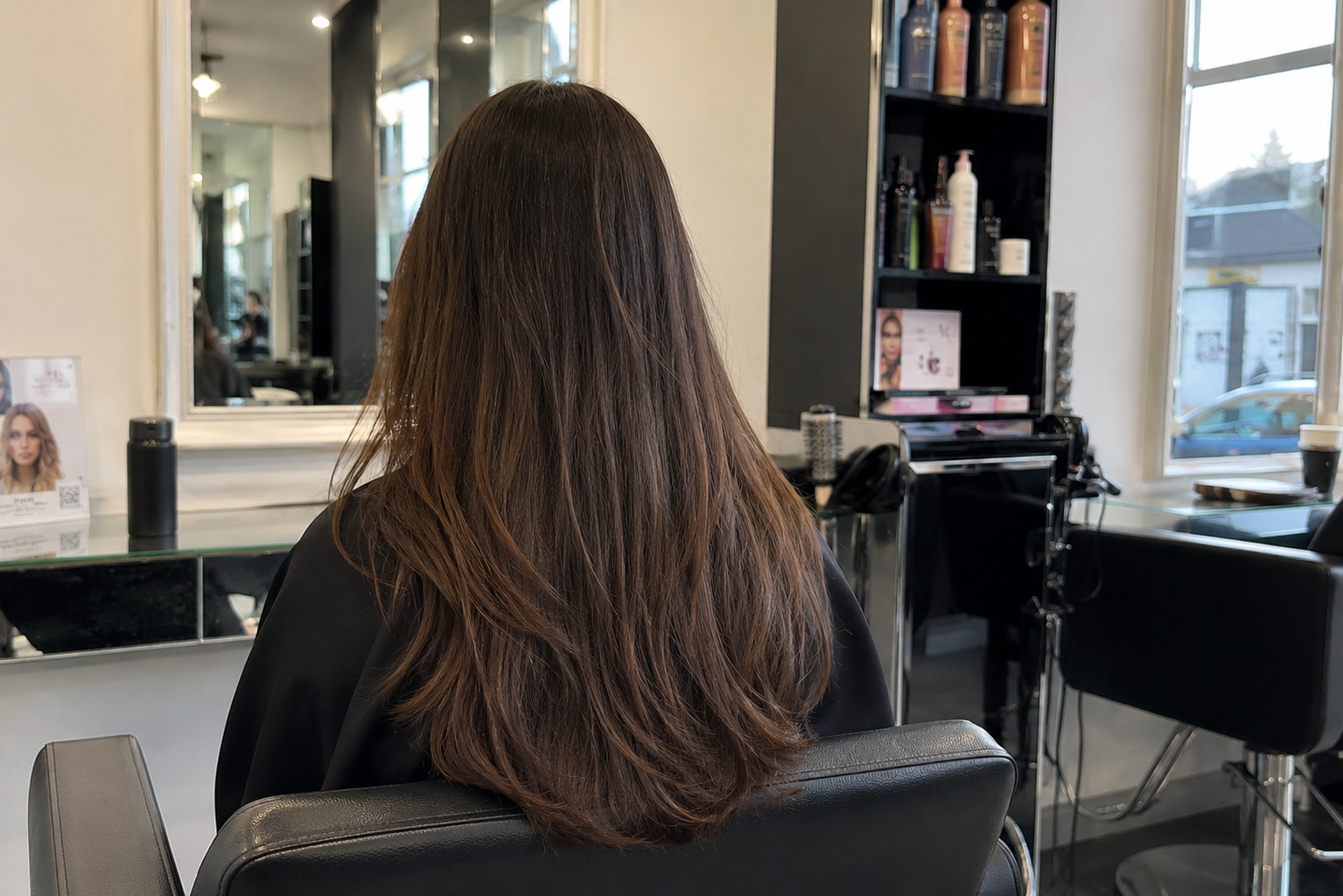 Long healthy hair showing the results of a good hair growth routine at Hair Nova Angel